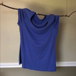 Plain purple tee shirt. Very soft. Swoop neck line